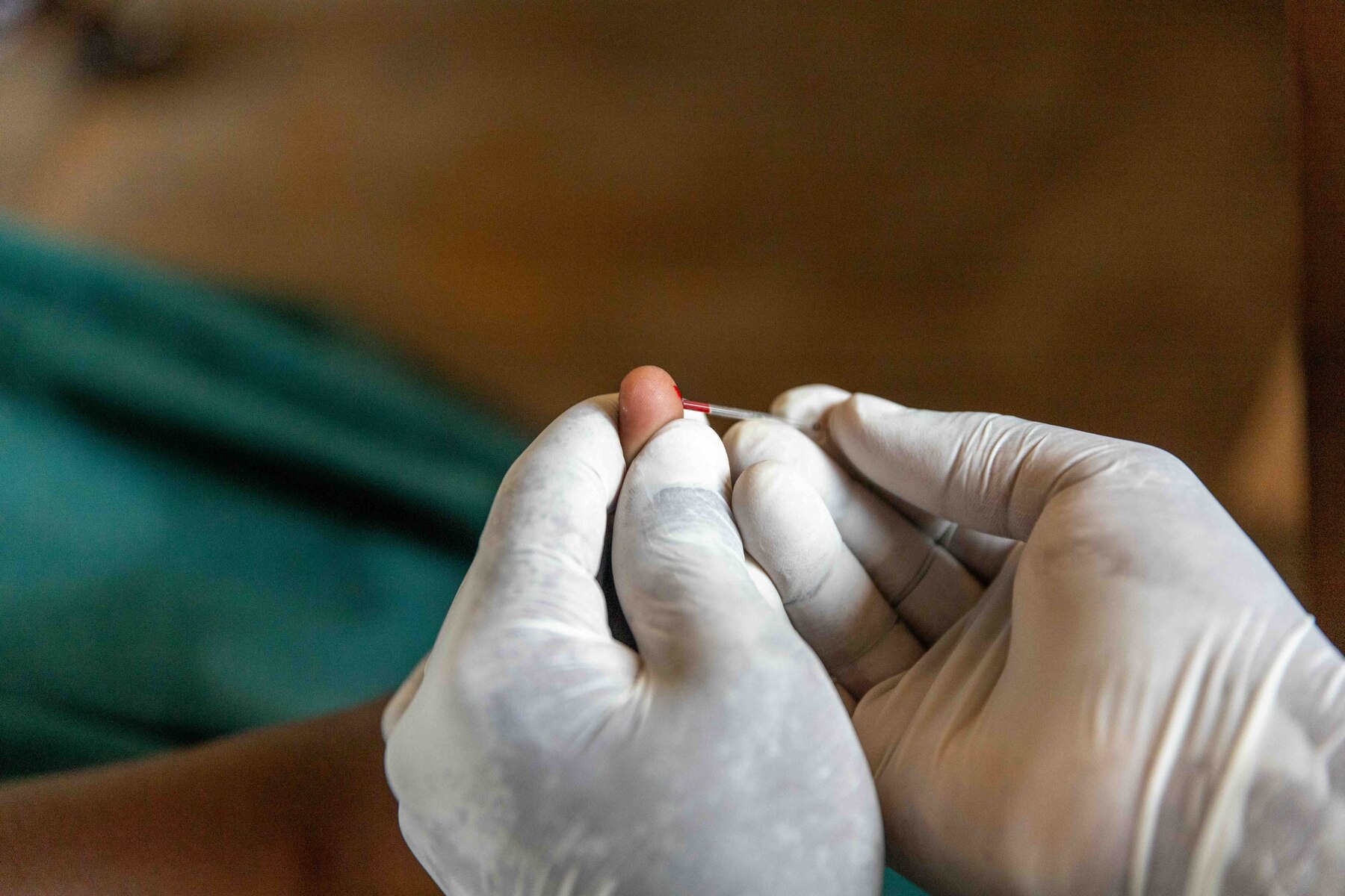 A clinician examining a child